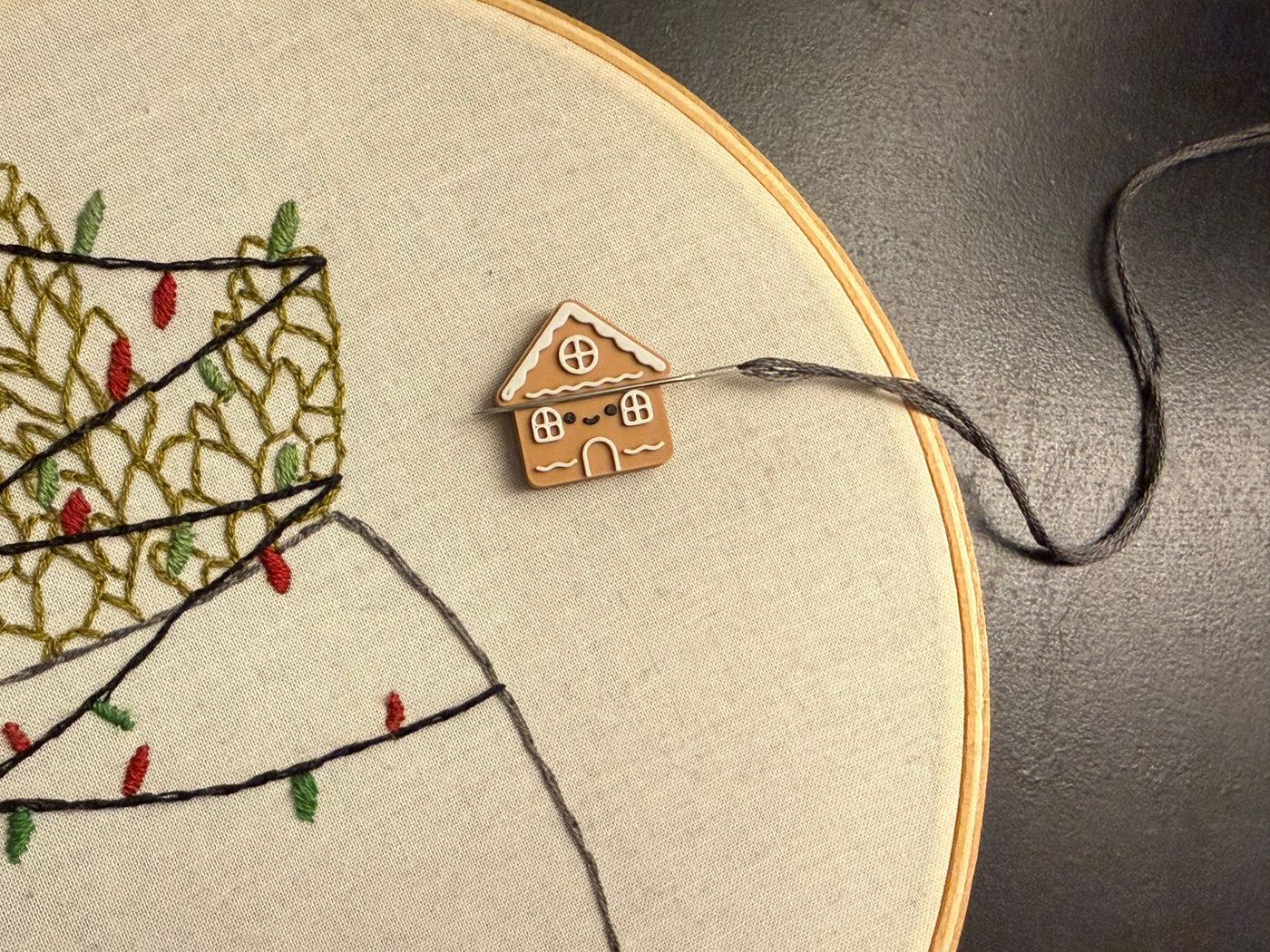 A gingerbread house needleminder for sewing