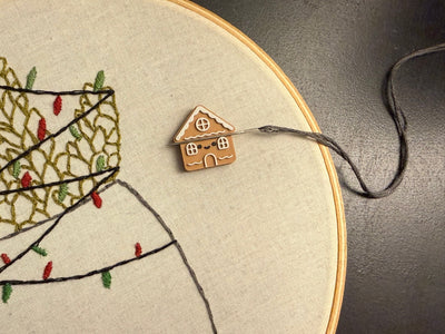 A gingerbread house needleminder for sewing